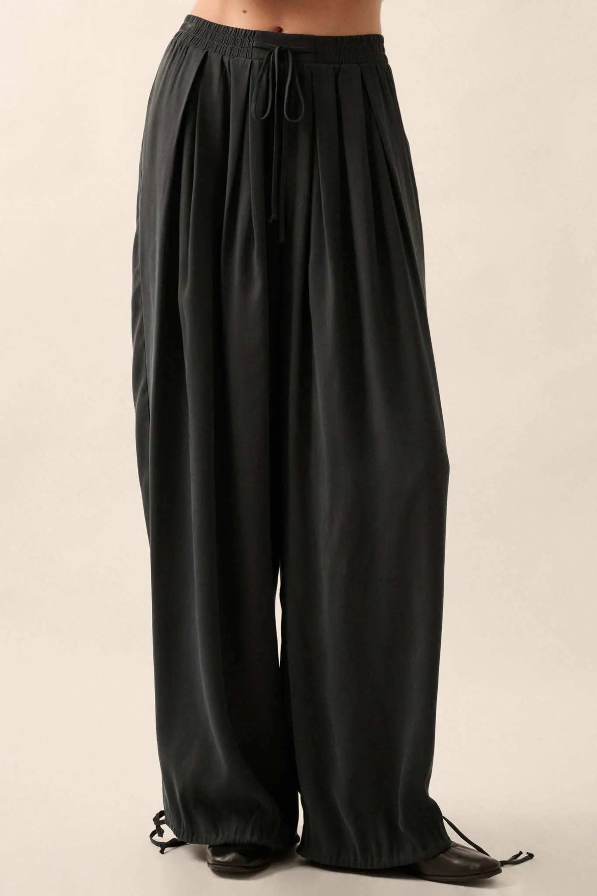 Loosely Translated Pleated Wide-Leg Harem Pants